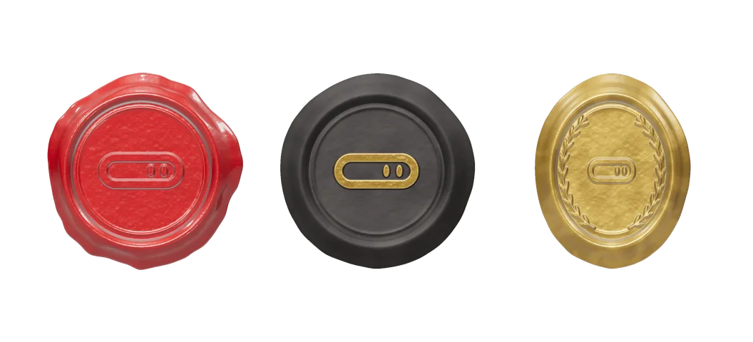 Three wax seals made with it: classic red, black with a gold mark, and a pearly gold oval with a wreath